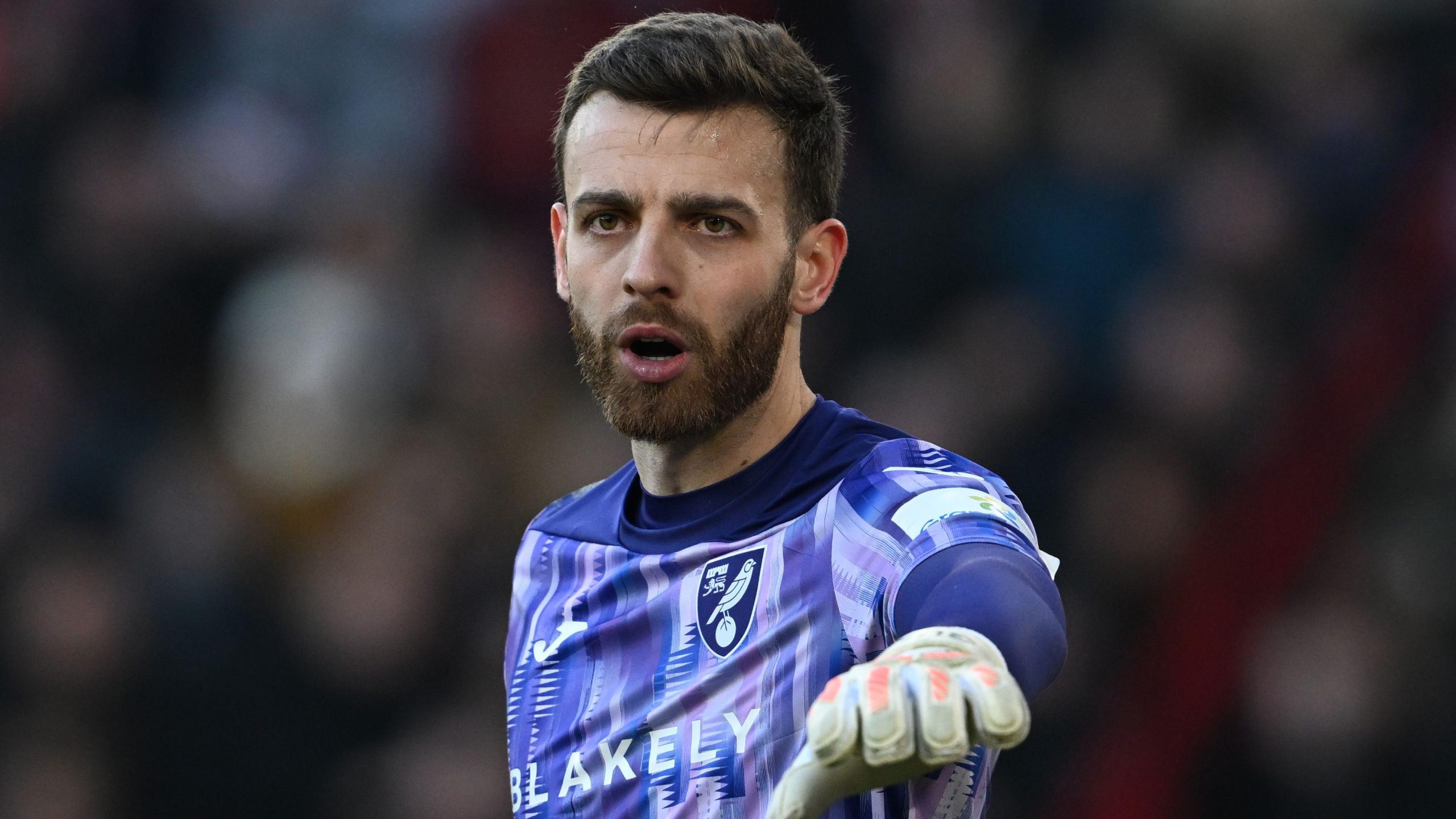 Angus Gunn launches dig at Norwich City over his Carrow Road exit